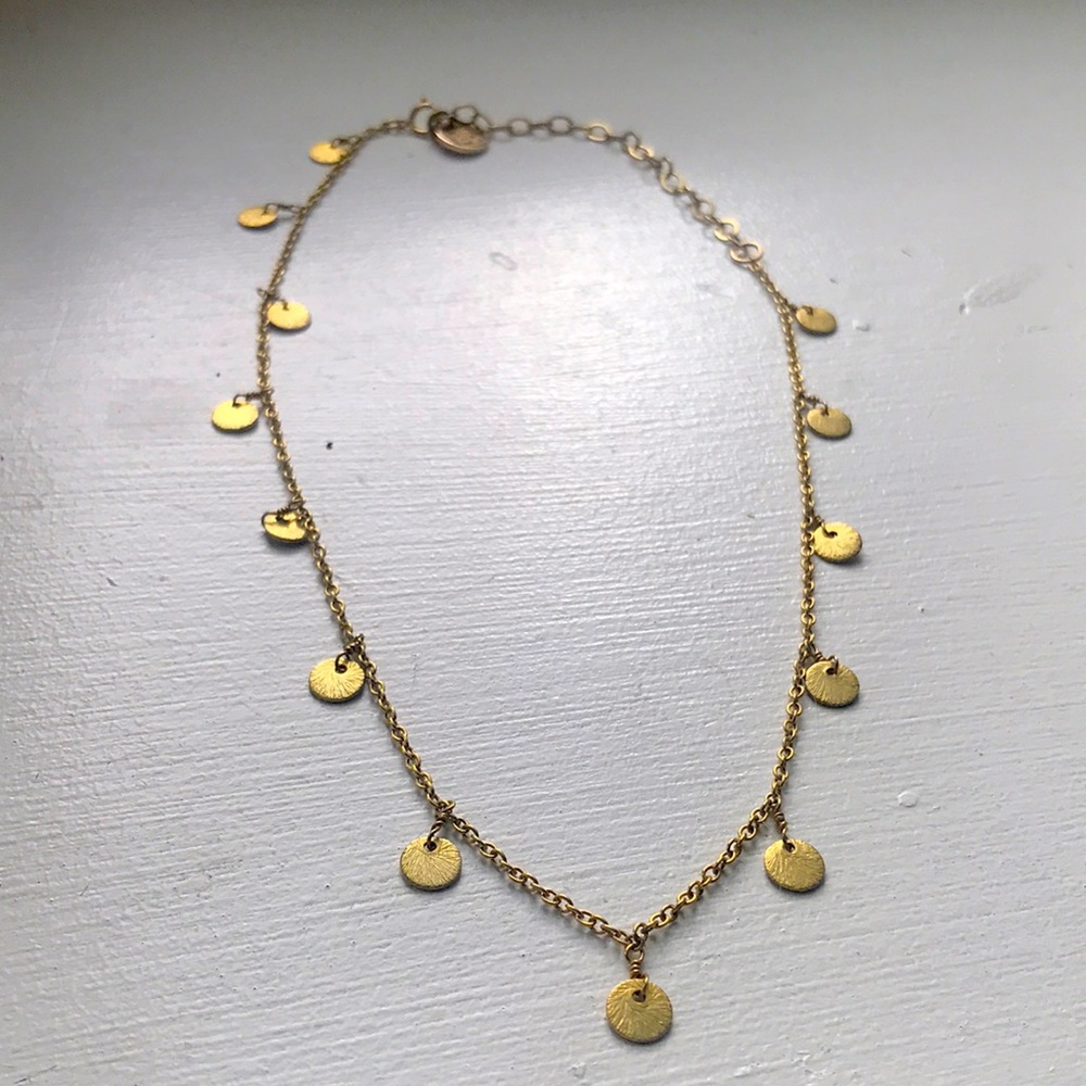 Gold charmed necklace